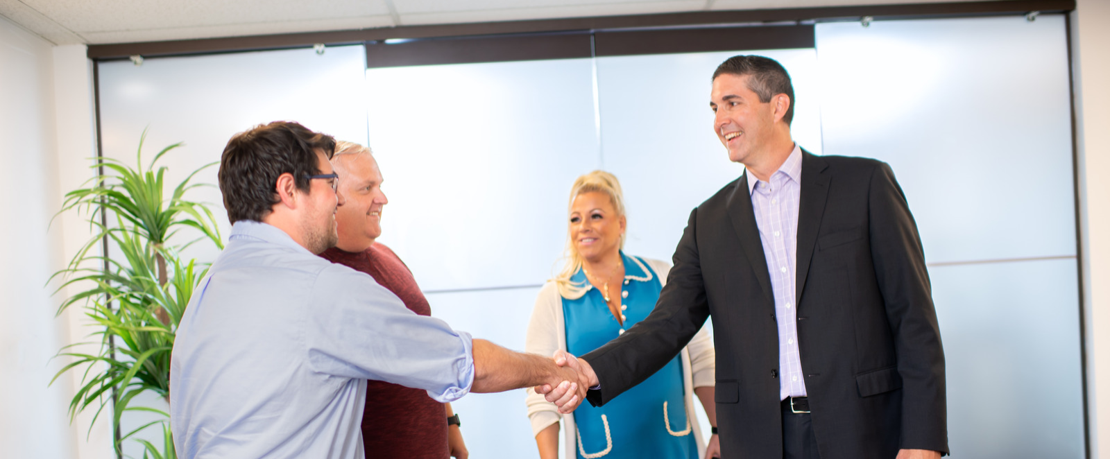 CFH and Dave Gutman shaking hands in Albany Room